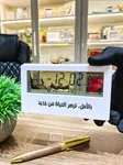ساعة صغيرة ودرجة حرارة